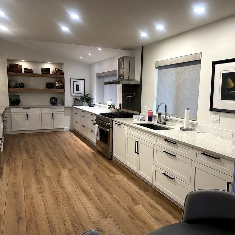 White Shaker full kitchen with wood flooring in West Kelowna, British Columbia